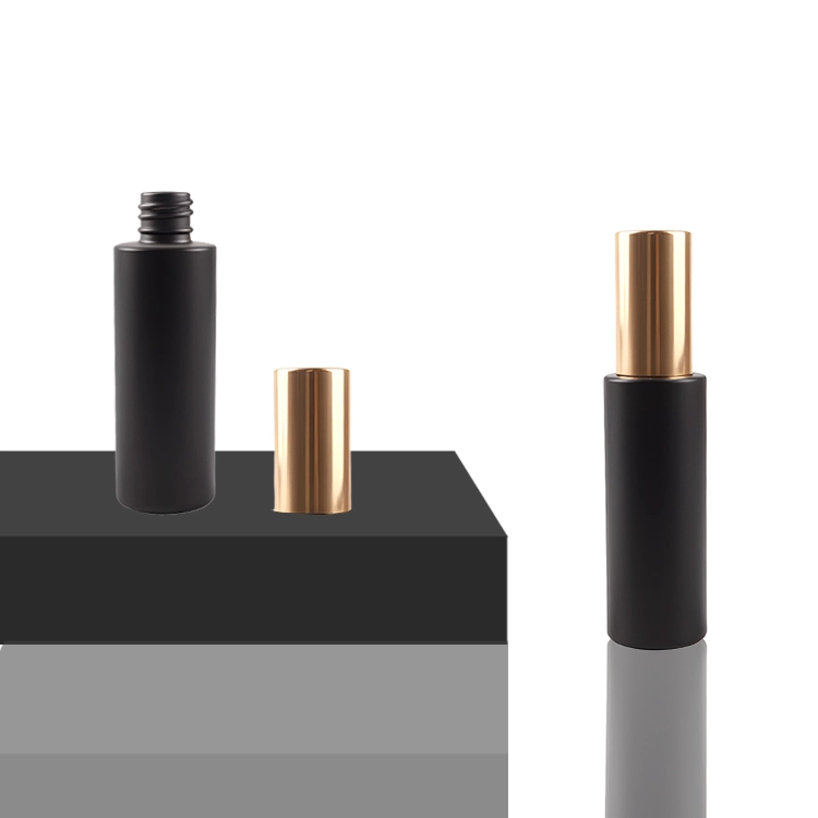Black cylindrical perfume bottle