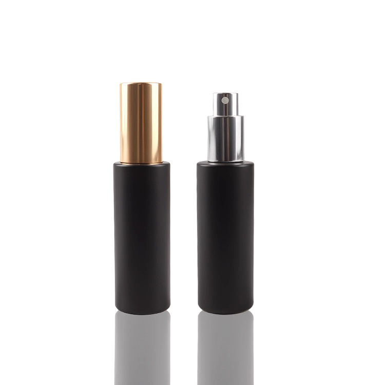 Black cylindrical perfume bottle